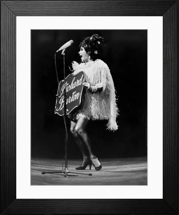 Framed Print : Liz Taylor introduces her husband at a charity show in Paris on the day she became a Framed Print : Liz Taylor introduces her husband at a charity show in Paris on the day she became a
