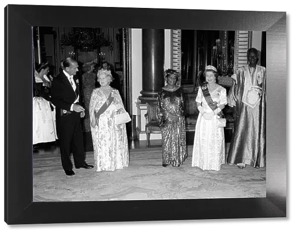L TO R. Prince Philip, Queen Mum. Queen Elizabeth II and President Abdou Diouf