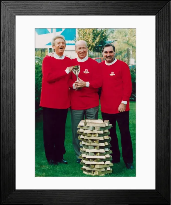 Framed Print : Denis Law with Bobby Charlton and George Best hold 1966 World Cup replica Framed Print : Denis Law with Bobby Charlton and George Best hold 1966 World Cup replica