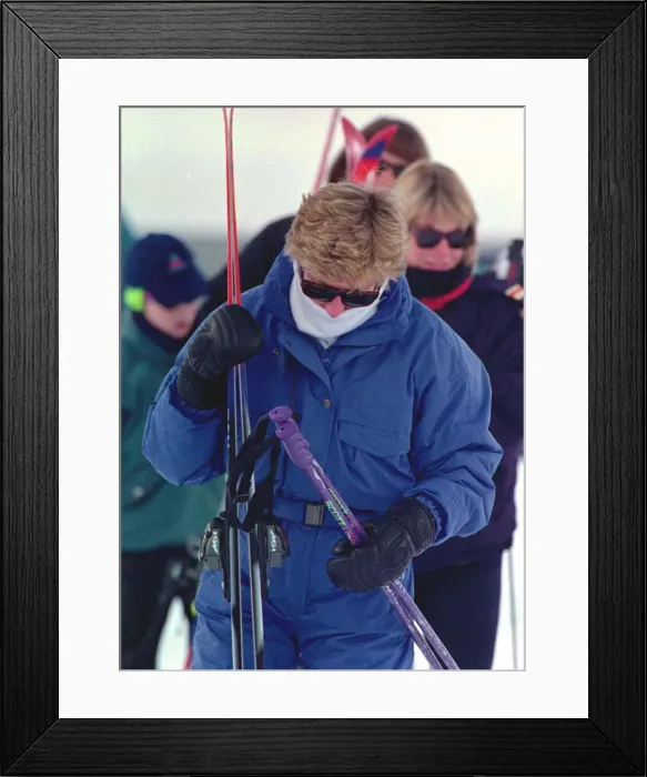 Framed Print : Princess Diana wearing ski-ing outfit and sunglasses during a ski-ing holiday with her Framed Print : Princess Diana wearing ski-ing outfit and sunglasses during a ski-ing holiday with her