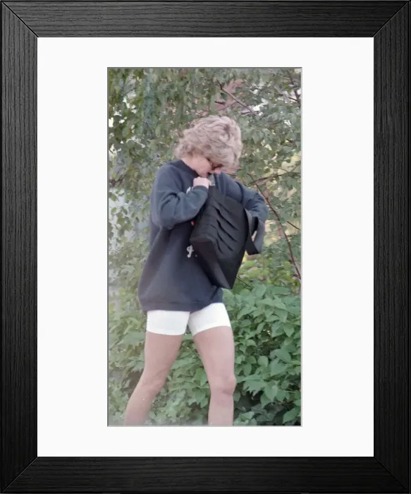 Framed Print : Princess Diana heads to a gym in Chelsea wearing a blue sweat shirt Framed Print : Princess Diana heads to a gym in Chelsea wearing a blue sweat shirt