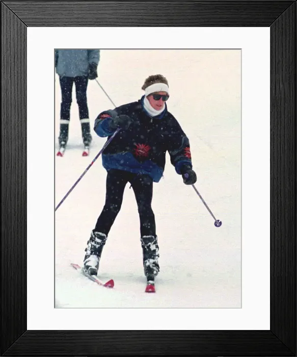 Framed Print : Princess Diana wearing ski-ing outfit and balaclava and sunglasses during a ski-ing