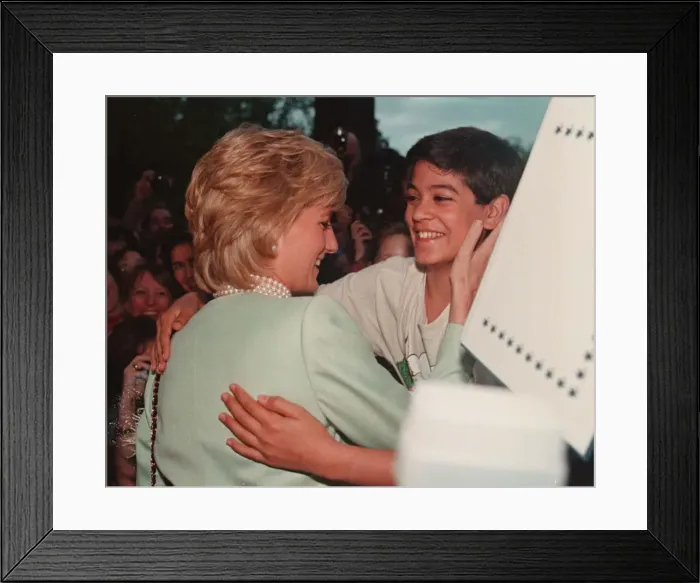 Framed Print : PRINCESS DIANA, WEARING A GREEN JACKET IS GREETED BY DAVID STUDNITZER DURING HER VISIT TO