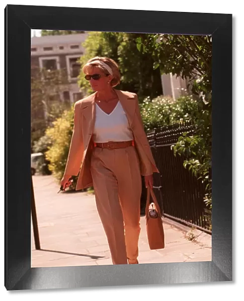 PRINCESS DIANA WEARING FAWN SUIT, WHITE TOP AND SUNGLASSES AND ALICE BAND AFTER HAVING