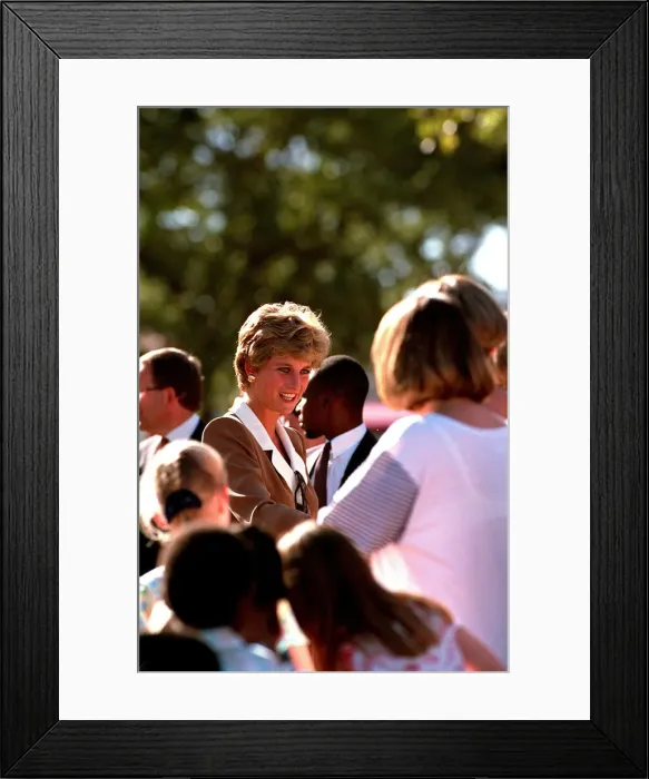 Framed Print : PRINCESS OF WALES GREETING PEOPLE DURING A VISIT TO RED CROSS CHARITY PROJECT IN ZIMBABWE Framed Print : PRINCESS OF WALES GREETING PEOPLE DURING A VISIT TO RED CROSS CHARITY PROJECT IN ZIMBABWE