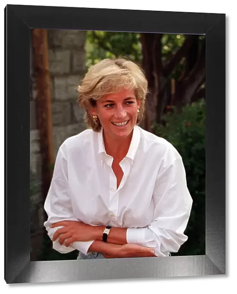 PRINCESS DIANA WEARING WHITE SHIRT AND JEANS DURING HER VISIT TO Bosnia - Herzegovina AS