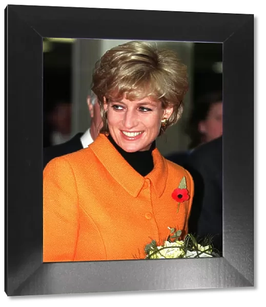 Princess Diana, wearing orange jacket, poppy and black jumper visits Liverpool
