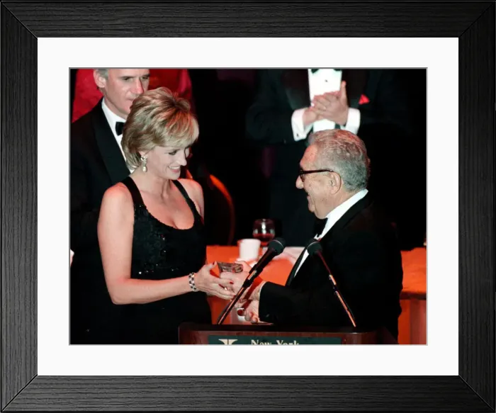 Framed Print : Princess Diana wears a black evening dress whilst receiving an award in New York