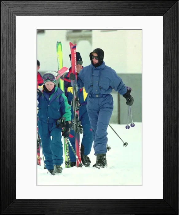 Framed Print : Princess Diana wearing ski-ing outfit and balaclava and sunglasses during a ski-ing