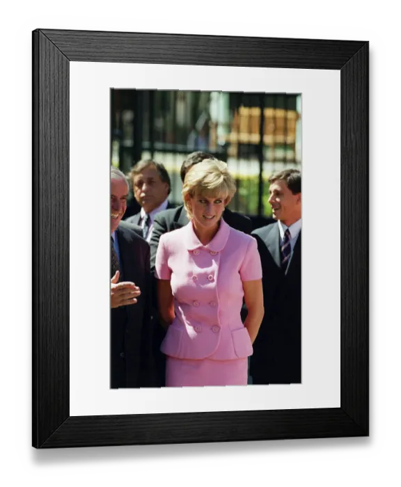 Framed Print : PRINCESS DIANA, WEARING PINK SUIT AND SMILING, GREETING PEOPLE ON HER TRIP TO ARGENTINA Framed Print : PRINCESS DIANA, WEARING PINK SUIT AND SMILING, GREETING PEOPLE ON HER TRIP TO ARGENTINA