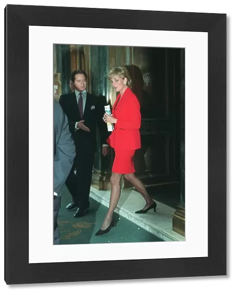 PRINCESS DIANA WEARING A RED SUIT, BLACK TIGHTS AND SHOES AT THE CAFE ROYAL - 27  /  09  /  1995
