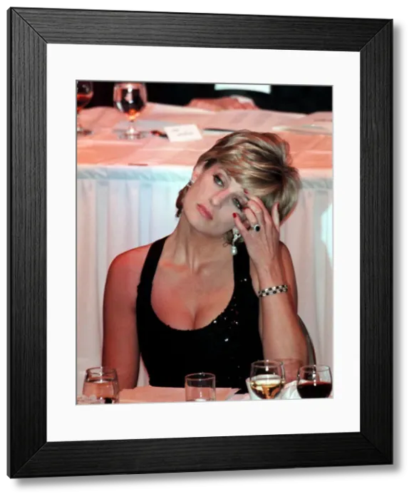 Framed Print : Princess Diana wears black evening dress during a reception where she was to receive a