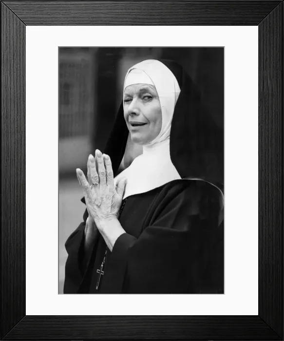 Framed Print : Honor Blackman dressed as a nun for photo call - February 1987 Framed Print : Honor Blackman dressed as a nun for photo call - February 1987