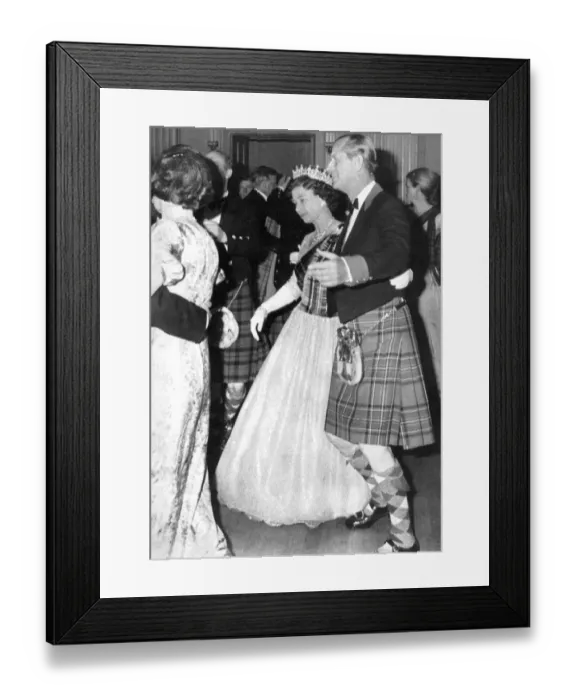 Framed Print : Queen Elizabeth II and Prince Philip dancing a Reel at a Royal Ball in Scotland