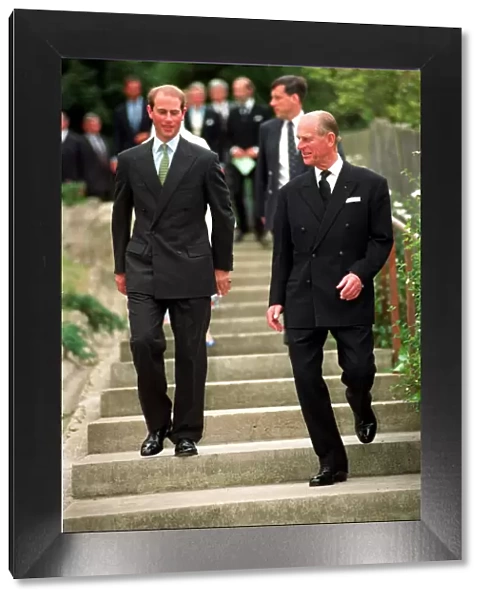 PRINCE EDWARD WITH FATHER THE DUKE OF EDINBURGH WALKING DOWN STEPS AS THEY ATTEND CHURCH