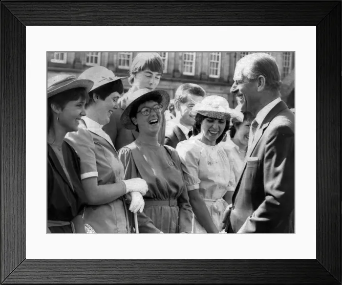 Framed Print : The Duke of Edinburgh. Prince Philip shares a joke with Lesley Wood a 16 year old blind Framed Print : The Duke of Edinburgh. Prince Philip shares a joke with Lesley Wood a 16 year old blind