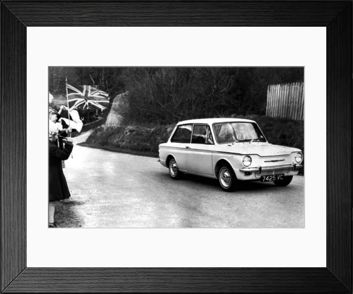 Framed Print : The Duke Of Edinburgh driving a Hillman Imp in Scotland. May 1963 Framed Print : The Duke Of Edinburgh driving a Hillman Imp in Scotland. May 1963