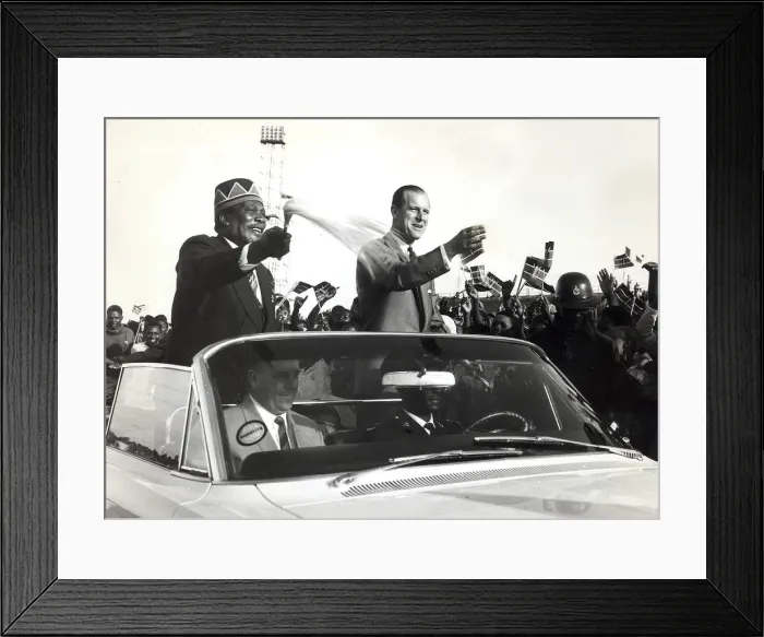 Framed Print : The Prime Minister of Kenya, Jomo Kenyatta drives through a crowd of people while Framed Print : The Prime Minister of Kenya, Jomo Kenyatta drives through a crowd of people while