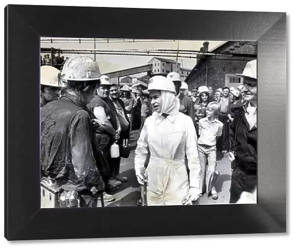 Queen Elizabeth II and Prince Philip meet Miners and Pit B officials during a tour of