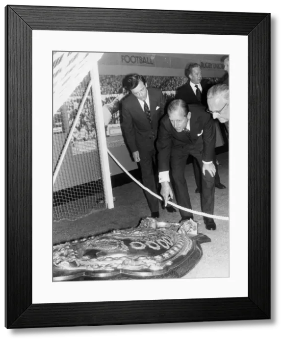 Framed Print : The Duke of Edinburgh. The Duke of Edinburgh looking at the Sherifs Charity Shield during Framed Print : The Duke of Edinburgh. The Duke of Edinburgh looking at the Sherifs Charity Shield during