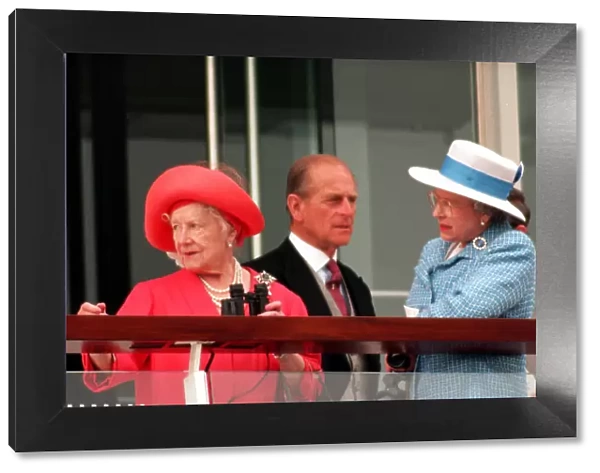 Queen Elizabeth II with Prince Philip and the Queen Mother pictured at Epsom race track