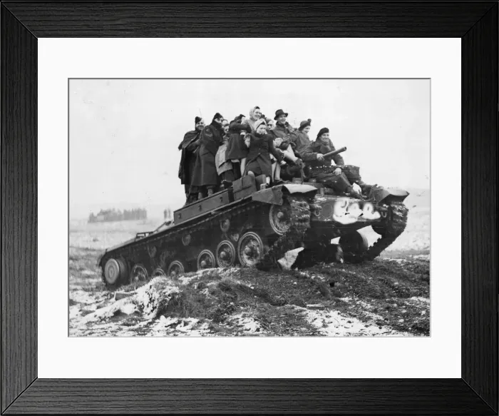 Framed Print : A tank carrying munition workers to mimic a battle arranged for the benefit of Framed Print : A tank carrying munition workers to mimic a battle arranged for the benefit of