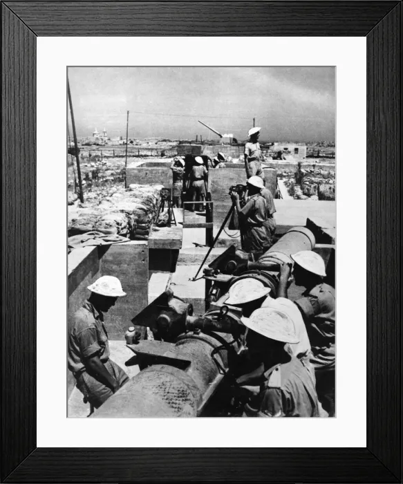 Framed Print : A Scene in Malta as heavy guns of an anti aircraft battery open fire on raiding enemy Framed Print : A Scene in Malta as heavy guns of an anti aircraft battery open fire on raiding enemy