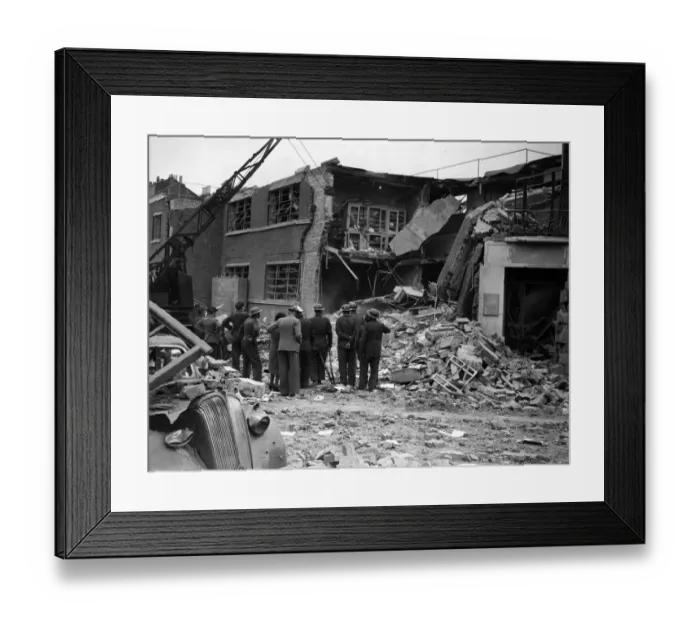 Framed Print : ARP rescue squads working among the demolished children