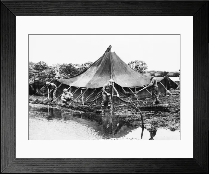 Framed Print : Group of G. Is build a dam to keep the river from flooding their tents Framed Print : Group of G. Is build a dam to keep the river from flooding their tents