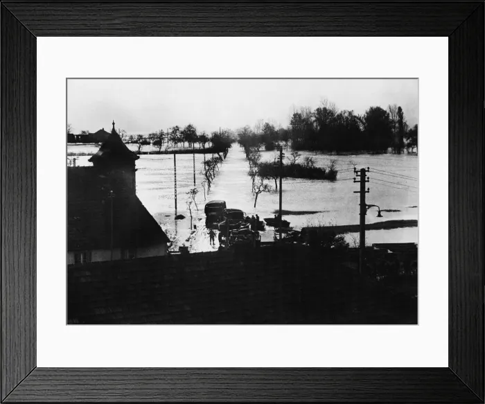 Framed Print : View of flooded sector near french village as river overflowed is bank