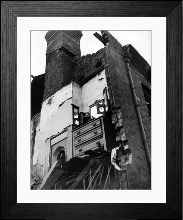 Framed Print : A dressing table is all that remains standing in a bombed house in Birmingham Framed Print : A dressing table is all that remains standing in a bombed house in Birmingham