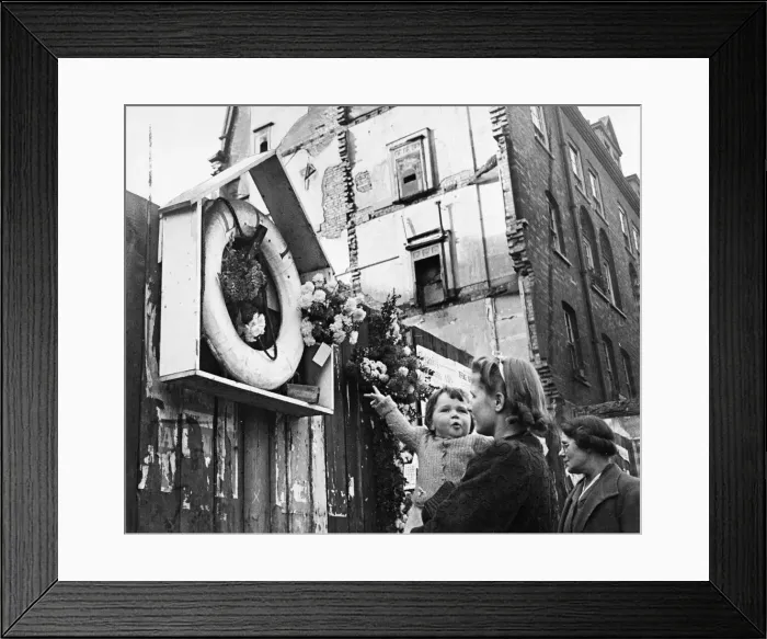 Framed Print : Floral tributes from neighbours, on the anniversary of The Blitz on flats in Stoke Framed Print : Floral tributes from neighbours, on the anniversary of The Blitz on flats in Stoke