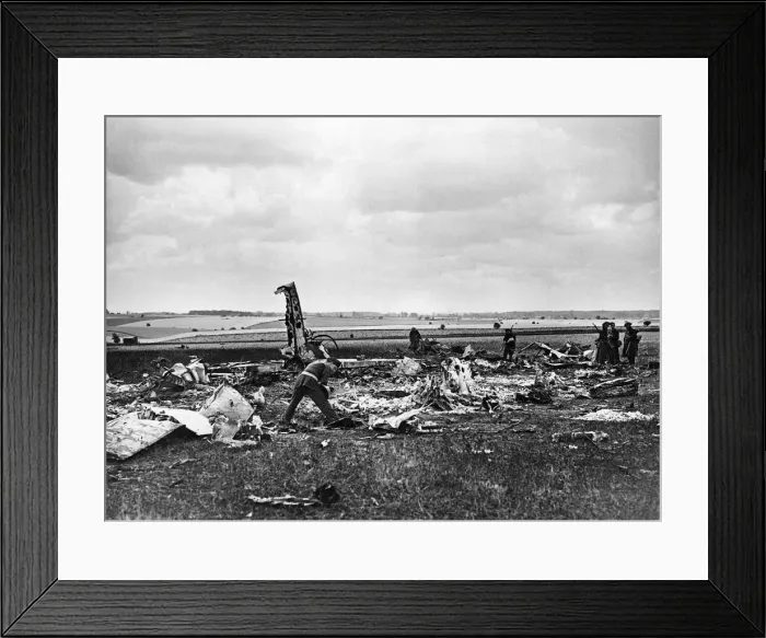 Framed Print : A destroyed Heinkel III bomber of the German Luftwaffe lies in a clover field in a small Framed Print : A destroyed Heinkel III bomber of the German Luftwaffe lies in a clover field in a small