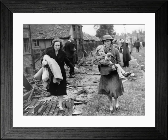 Framed Print : A mother (left) saved her daughters life in a raid Framed Print : A mother (left) saved her daughters life in a raid