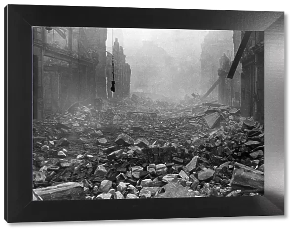 View of air raid damage to Fore Street, London, during the Blitz. Circa 1941