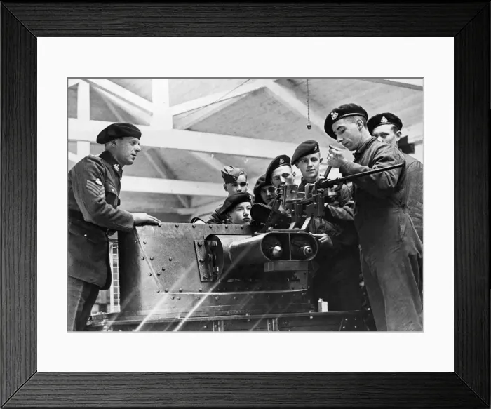 Framed Print : An explanation of the details of an anti-tank gun being given to members of a West Framed Print : An explanation of the details of an anti-tank gun being given to members of a West