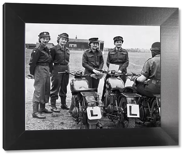 Some of the girls of the Womens Royal Army Corps who are learning to handle motorcycles
