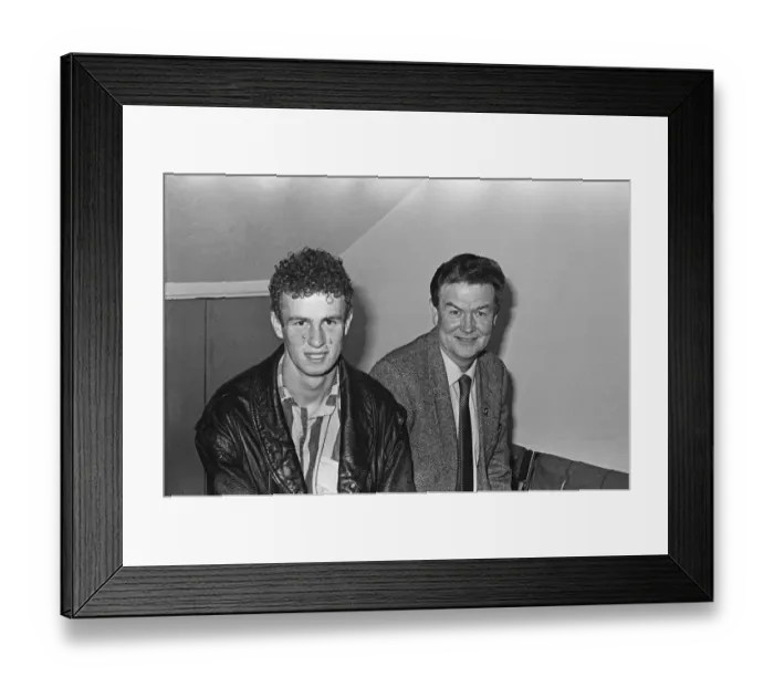 Framed Print : Michael O Neill seen here with his father Des, shortly after arriving in Newcastle