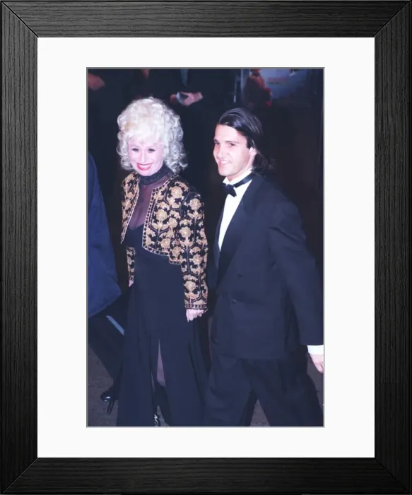 Framed Print : BARBARA WINDSOR AND GUEST ATTENDING THE FILM PREMIERE OF MIRACLE ON 34TH STREET Framed Print : BARBARA WINDSOR AND GUEST ATTENDING THE FILM PREMIERE OF MIRACLE ON 34TH STREET