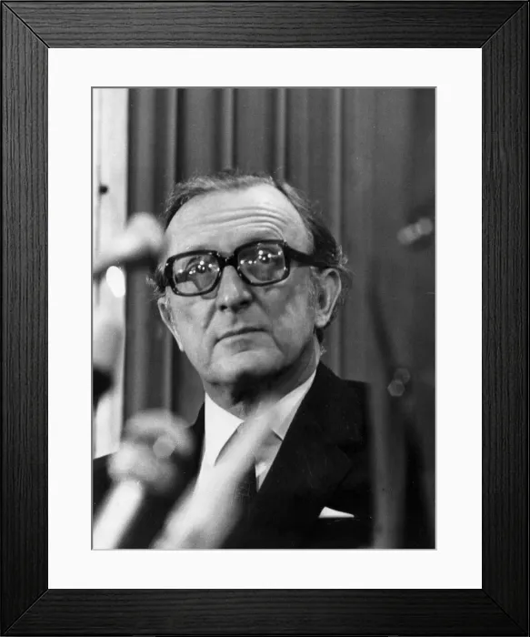 Framed Print : Lord Carrington at press conference behind microphones - February 1974 Framed Print : Lord Carrington at press conference behind microphones - February 1974