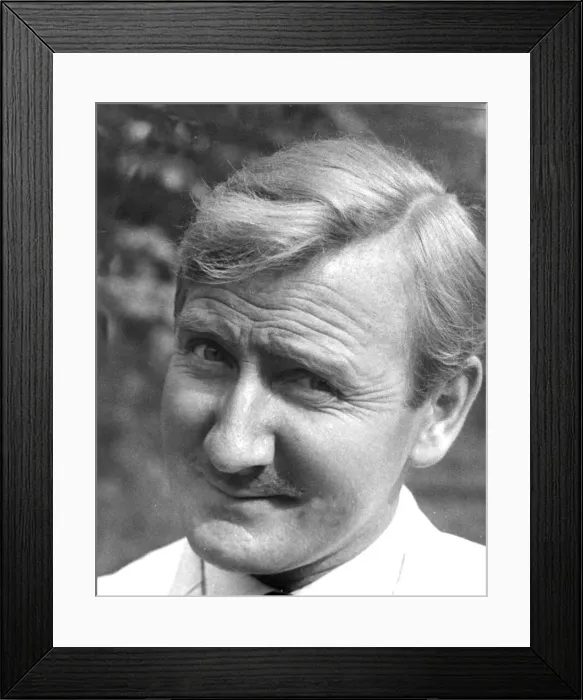 Framed Print : Leslie Phillips smiling during filming Doctor in Clover - October 1965