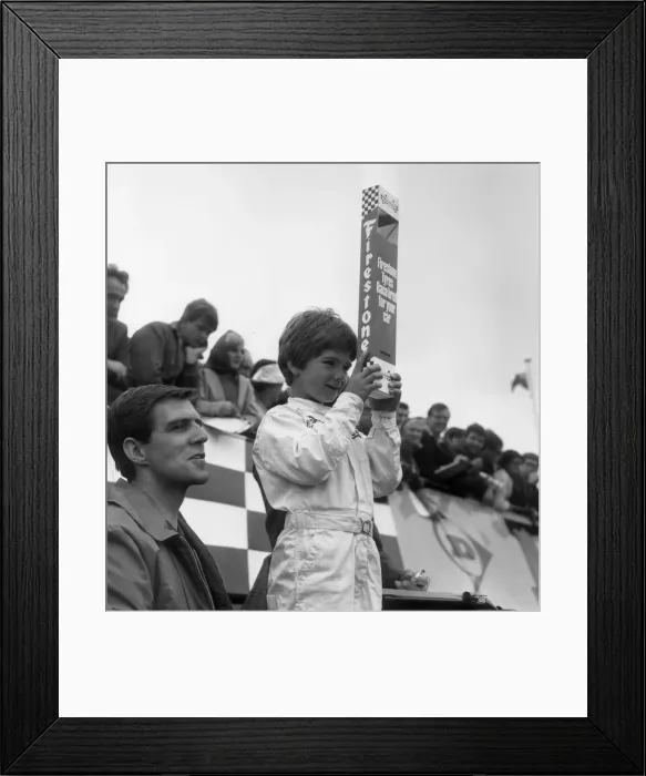Framed Print : DAMON HILL, AGED SIX WATCHES HIS FATHER GRAHAM HILL RACE AT SILVERSTONE Framed Print : DAMON HILL, AGED SIX WATCHES HIS FATHER GRAHAM HILL RACE AT SILVERSTONE
