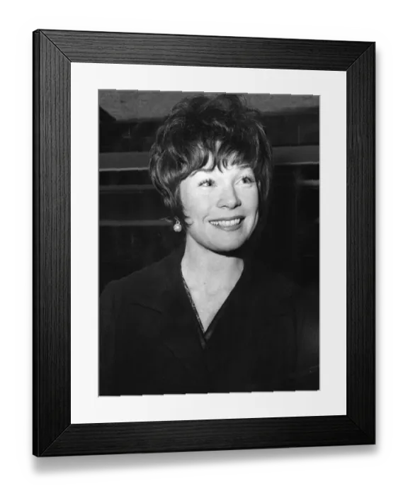 Framed Print : Shirley MacLaine smiling at London Airport - December 1964