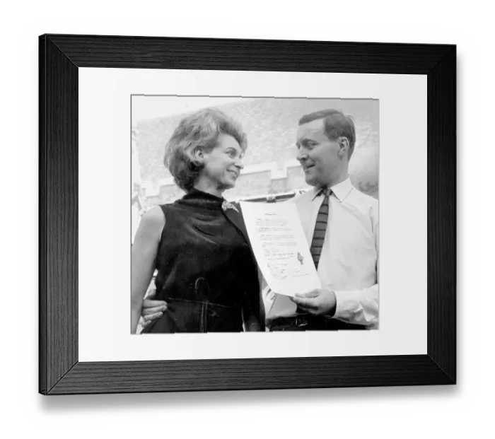 Framed Print : Tony Benn and wife Caroline standing outside Houses of Parliament, Westminster