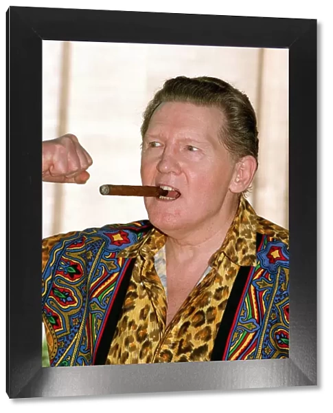 JERRY LEE LEWIS IN COLOURFUL SHIRT SMOKING A CIGAR 30  /  06  /  1993