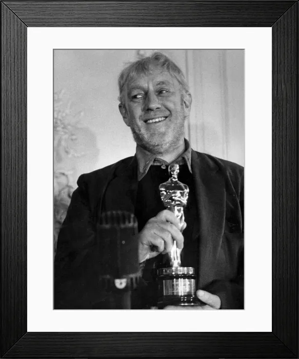Framed Print : Alec Guinness receiving his Oscar for Best Actor in The Bridge on the River Kwai Framed Print : Alec Guinness receiving his Oscar for Best Actor in The Bridge on the River Kwai