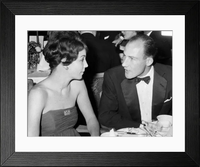 Framed Print : Stirling Moss talking to wife Katie at Lord Taverner Framed Print : Stirling Moss talking to wife Katie at Lord Taverner
