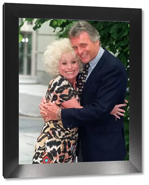 BARBARA WINDSOR AND PETER DEAN - ACTORS CUDDLE EACH OTHER AT THE LAUNCH OF THE PLAY