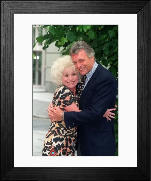 Framed Print : BARBARA WINDSOR AND PETER DEAN - ACTORS CUDDLE EACH OTHER AT THE LAUNCH OF THE PLAY