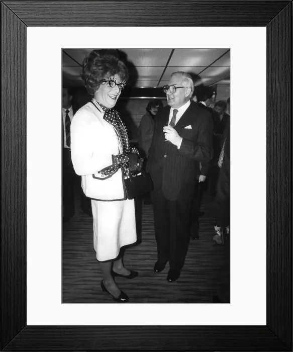 Framed Print : Barry Humphries as Dame Edna Everedge talking to Jim Callaghan at Standard theatre awards